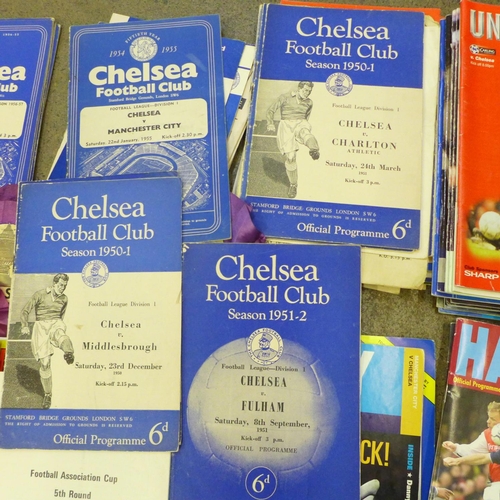 740 - A collection of football programmes, including 1950's Chelsea, some 1949, two Chelsea rosettes and o... 