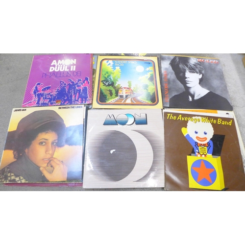 742 - A box of LP records including Elvis Presley, Moody Blues, Genesis and classical, etc.