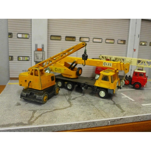 759 - Three Dinky Toys model cranes diorama, comprising Jones Fleetmaster, Coles Hydra Truck and Coles Mob... 