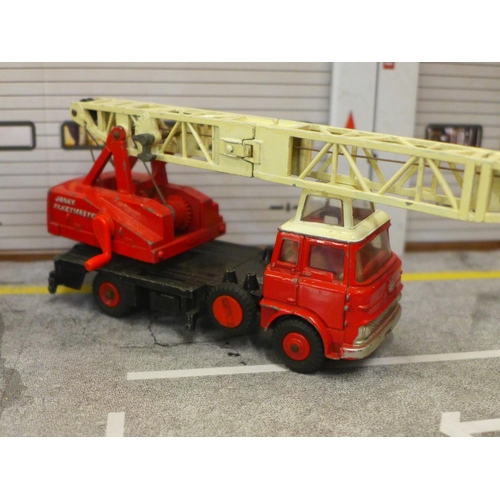 759 - Three Dinky Toys model cranes diorama, comprising Jones Fleetmaster, Coles Hydra Truck and Coles Mob... 