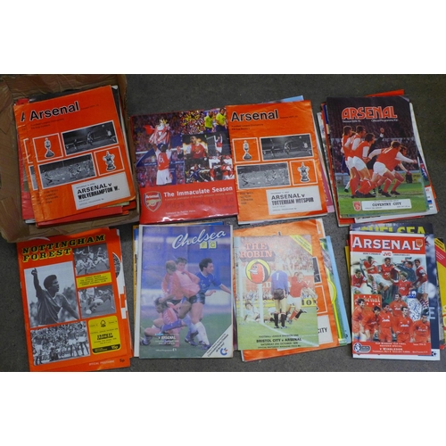 762 - Football programmes, Arsenal home and away (65 no.) and a book The Immaculate Season