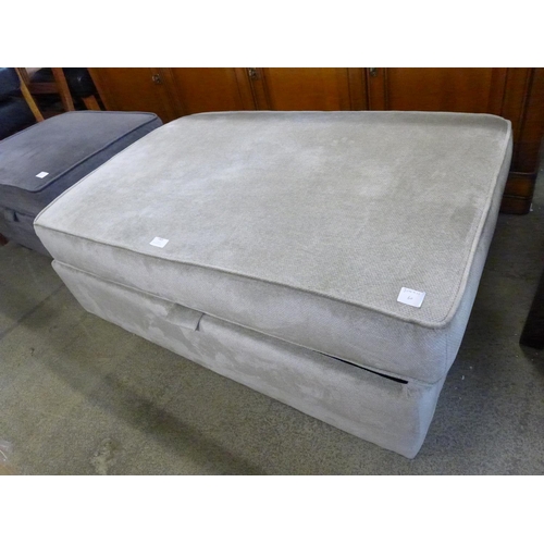 1770 - A cream upholstered footstool - damaged