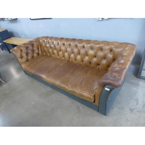 1488 - A Stanton three seat leather and tweed button back sofa - used, travel feet.