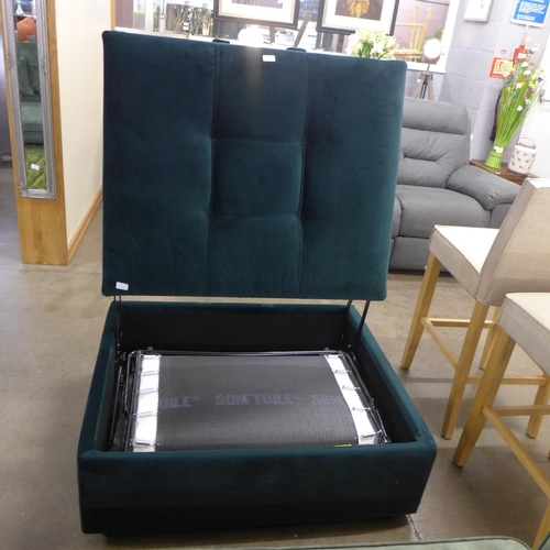 1657 - A dark green upholstered footstool/pull out bed