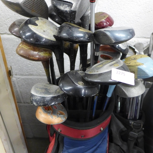 2275 - 2 Golf bags (Dunlop & Wild Thing) with various golf irons and woods inc. Forgan, Mitsubishi, Slazeng... 