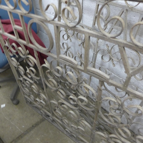 2285 - Pair of scroll design cast metal gates with the words 