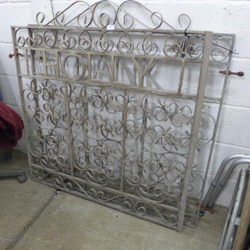 2285 - Pair of scroll design cast metal gates with the words 