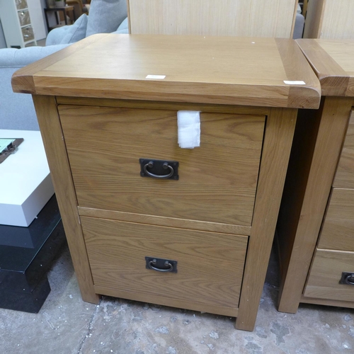 1655 - A Winchester oak two drawer chest (CO-LTV)  * This lot is subject to VAT Damage to front left hand s... 