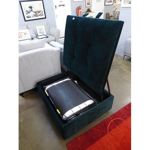 1657 - A dark green upholstered footstool/pull out bed