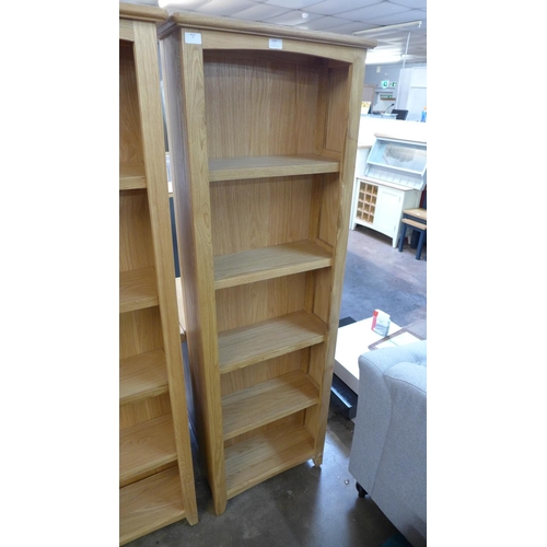 1665 - A Gloucester oak tall narrow bookcase (GAO-LBC) * This lot is subject to VAT Damaged back panel.