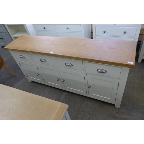 1681 - A Winchester oak extra large four door sideboard (CO-4DS) * This lot is subject to VAT Marked.