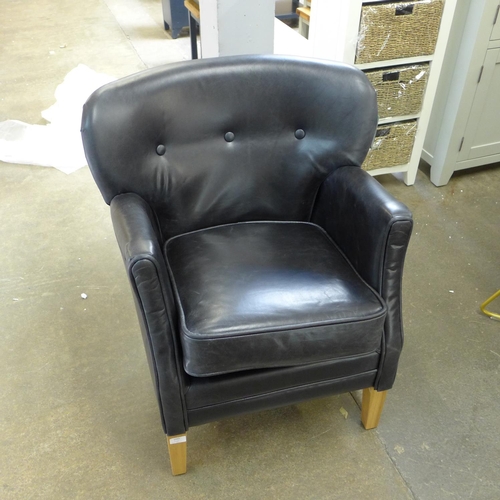 1693 - A black leather button back armchair