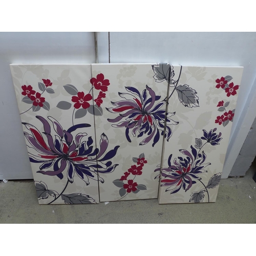 1768 - A floral three piece canvas set (W120 x H90cm)