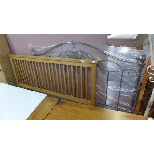 1686 - A wooden king size headboard and a decorative metalwork king size headboard



* This lot is subject... 