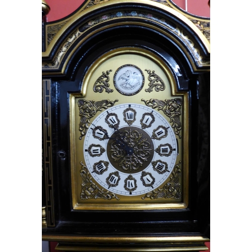 104 - A black Japanned triple wright longcase clock