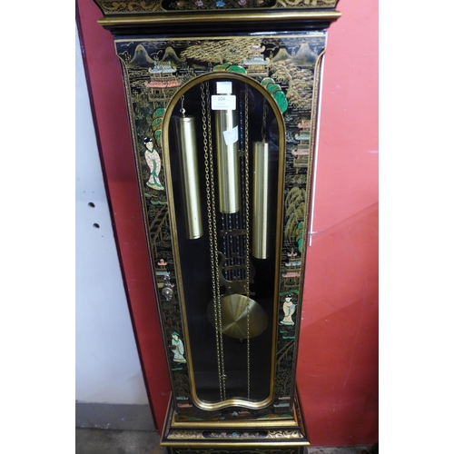 104 - A black Japanned triple wright longcase clock