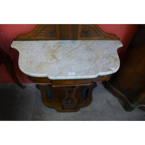 106 - A Victorian walnut and marble topped tree shaped hallstand