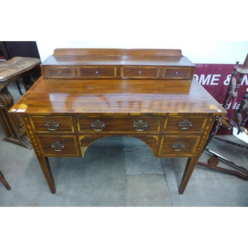 117 - An Edward VII inlaid mahogany writing table