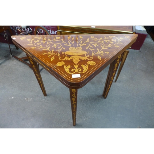 120 - A 19th Century Dutch marquetry inlaid mahogany triangular games table