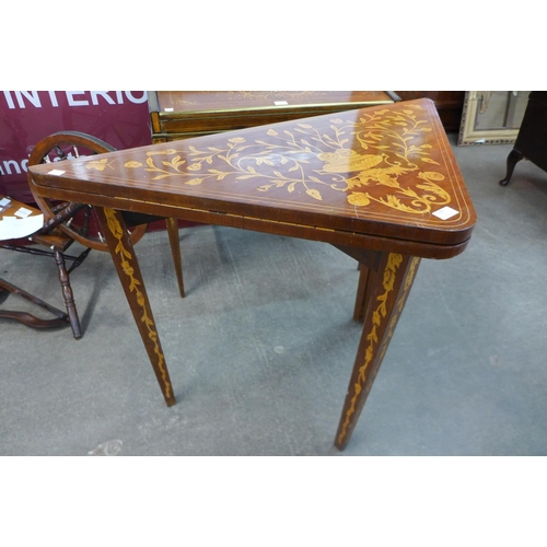 120 - A 19th Century Dutch marquetry inlaid mahogany triangular games table