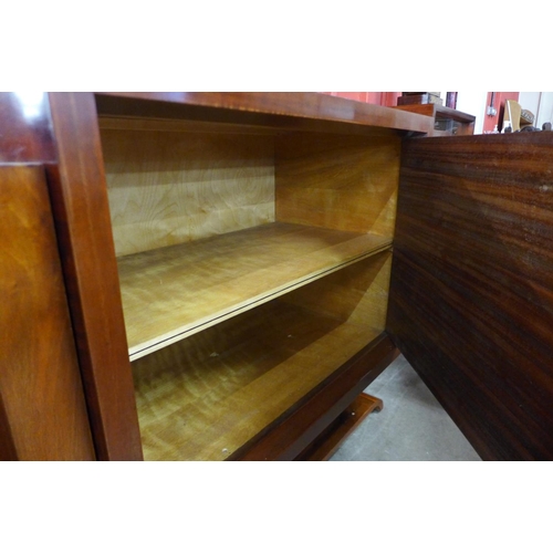 121 - A substantial Art Deco walnut and parcel gilt mirrorback sideboard