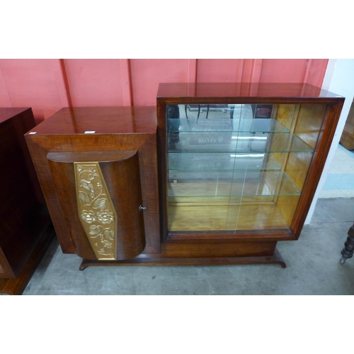 122 - An Art Deco walnut and parcel gilt cocktail cabinet