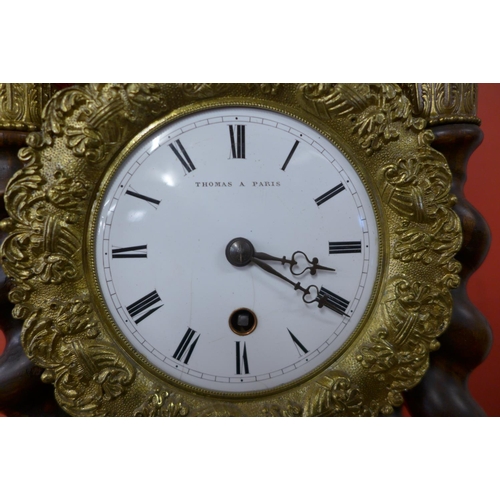 123 - A 19th Century French inlaid rosewood portico clock, with turned barleytwist columns, the enamel dia... 