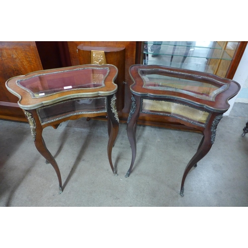 124 - A pair of French Louis XV style mahogany and gilt metal bijouterie tables