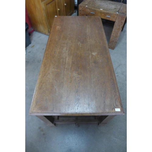 125 - An Arts and Crafts oak refectory table