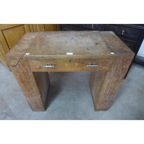 126 - An Art Deco Heals limed oak desk