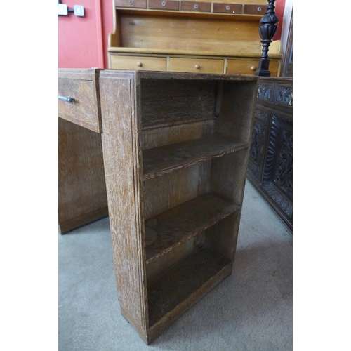 126 - An Art Deco Heals limed oak desk