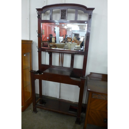 131 - A Victorian carved mahogany hallstand