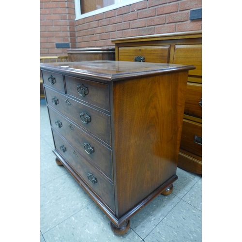 136 - A George II style inlaid burr walnut and mahogany bachelors chest of drawers