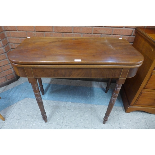 138 - A Victorian mahogany fold over tea table