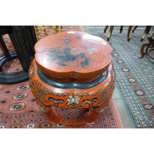 141 - A Chinese red lacquered chinoiserie occasional table