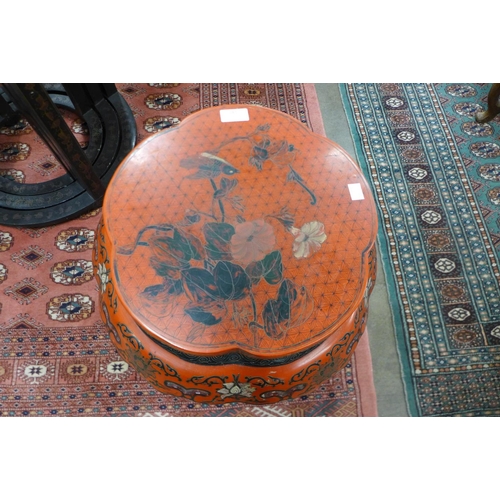 141 - A Chinese red lacquered chinoiserie occasional table