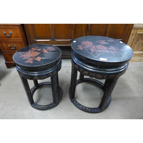 143 - A Chinese black lacquered chinoiserie circular nest of tables