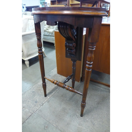 153 - A Victorian rosewood corner jardiniere stand