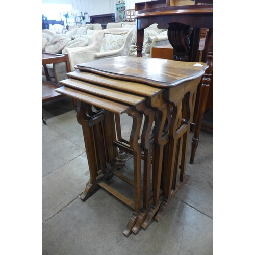 154 - A French Art Nouveau oak and marquetry nest of quartetto tables