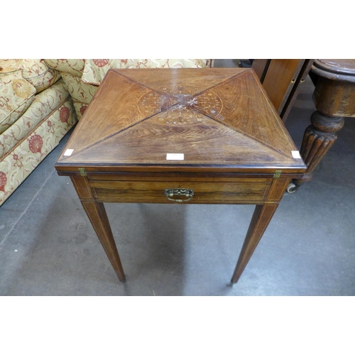 166 - A Victorian inlaid rosewood envelope card table, by Jas Shoolbred & Co.