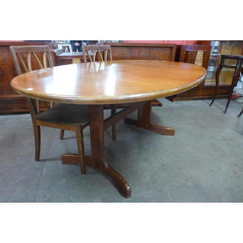 173 - A G-Plan Fresco teak extending dining table and four chairs