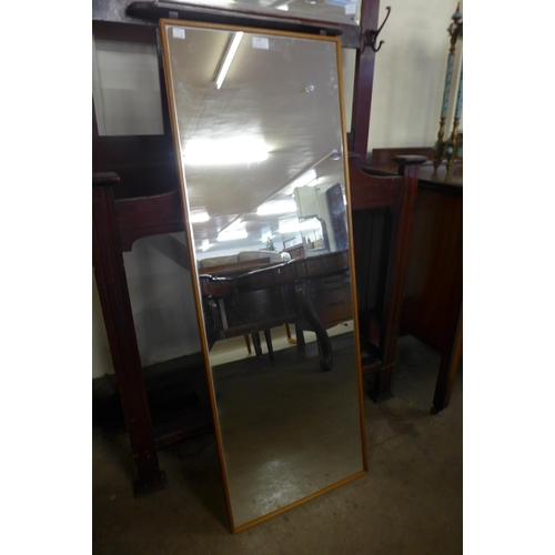 176 - A teak framed mirror