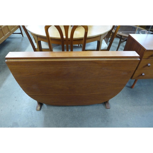 192 - A teak drop-leaf table