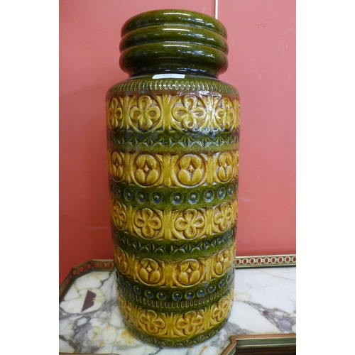 204 - A West German green and ochre glazed porcelain vase