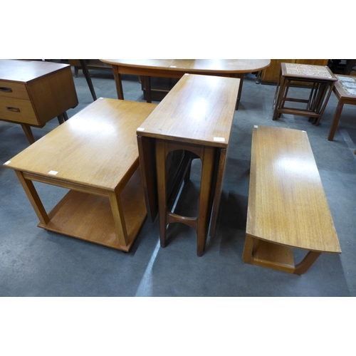 206 - A metamorphic teak coffee table, another teak coffee table and a teak drop leaf table