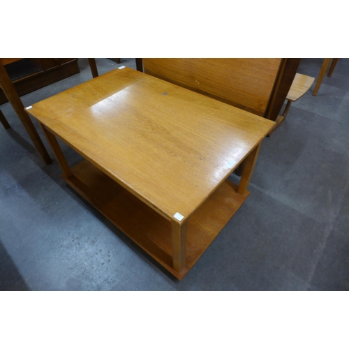 206 - A metamorphic teak coffee table, another teak coffee table and a teak drop leaf table