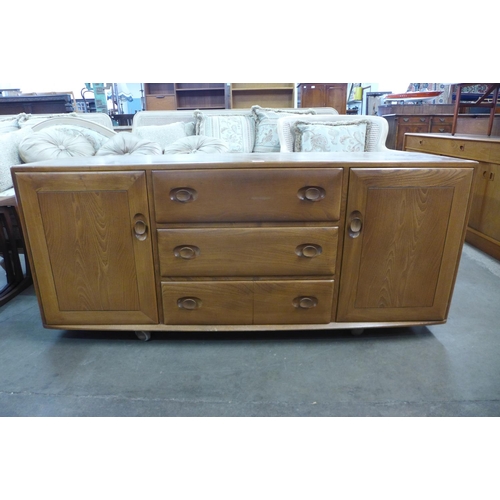 214 - An Ercol Blonde elm Windsor sideboard