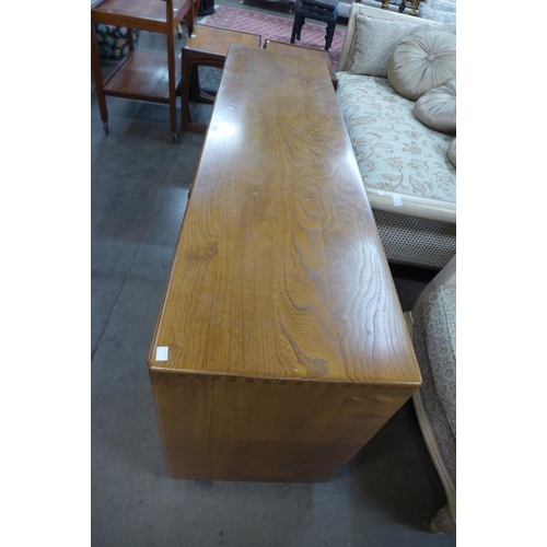 214 - An Ercol Blonde elm Windsor sideboard