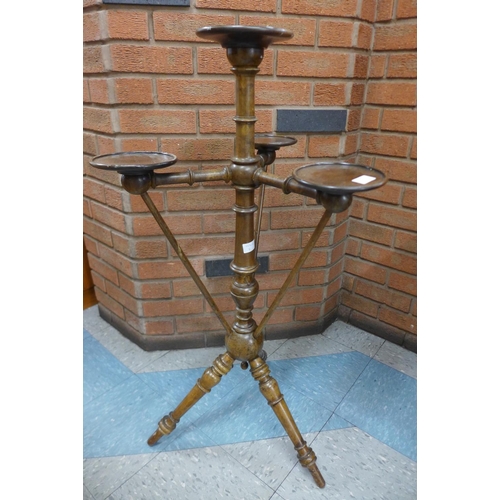 217 - A Victorian turned mahogany candle stand