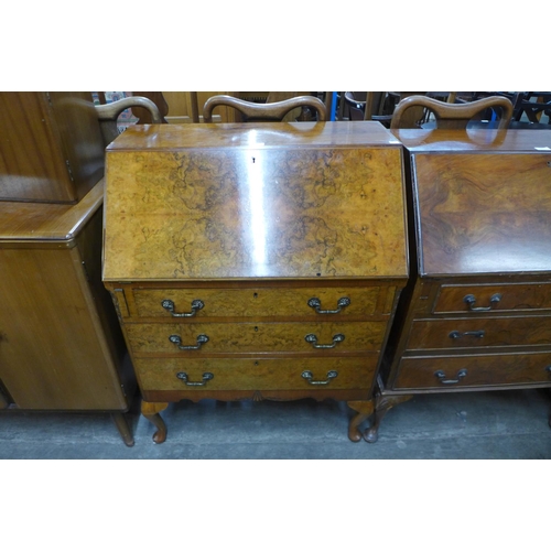 228 - A burr walnut bureau de dame